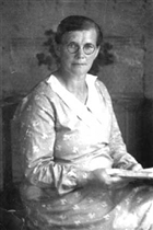 KVINNA