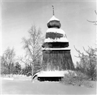 VINTERBILD KLOCKSTAPEL FRILUFTSMUSEUM