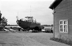 FLOTTNING BOGSERBÅT BIL KONTORSBYGGNAD