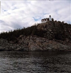 HÖGA KUSTEN HAV Ö BERG FYR