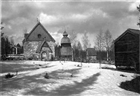 VÅRBILD FRILUFTSMUSEUM KYRKA KLOCKSTAPEL STIGPORT